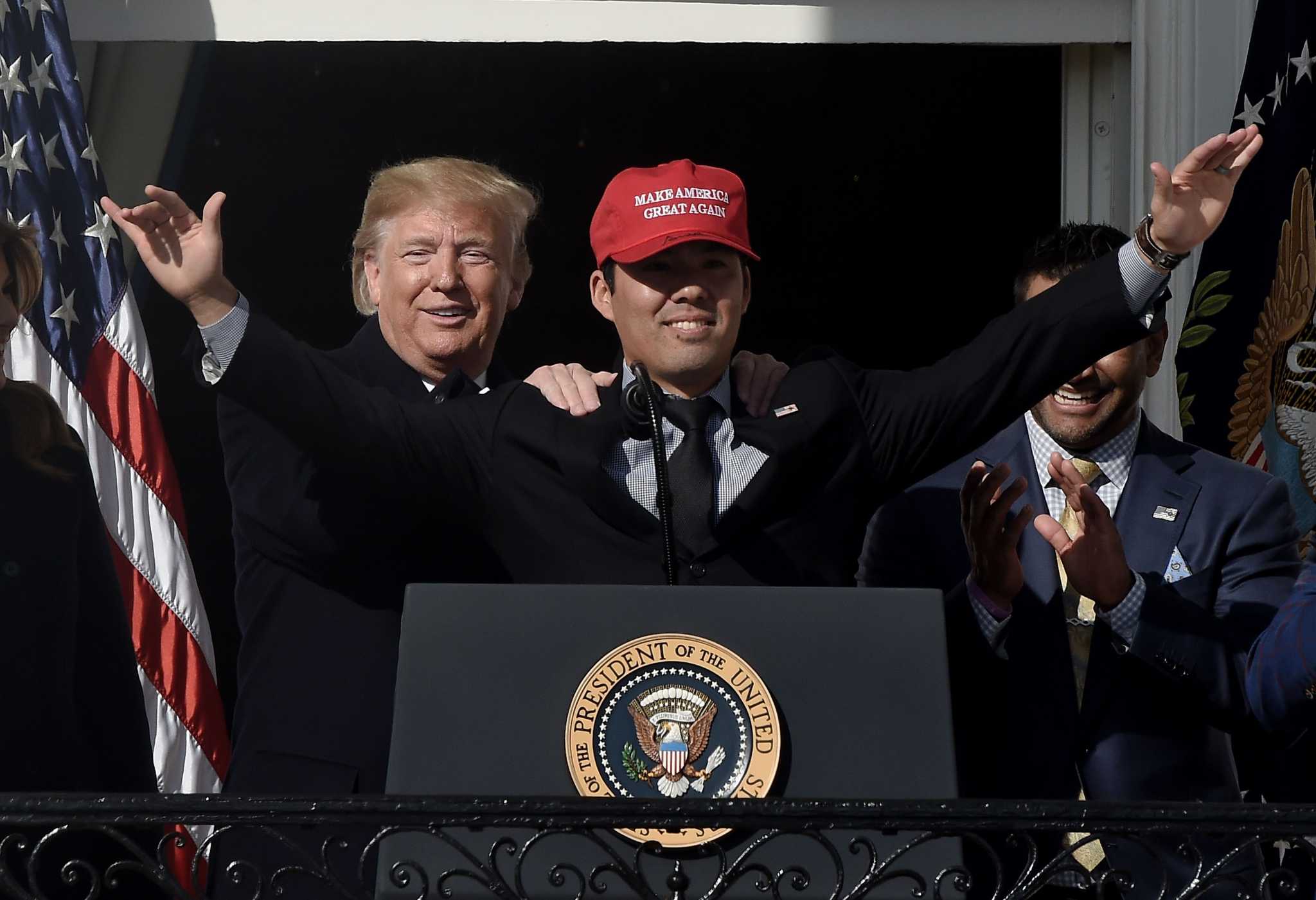 Washington, United States. 04th Nov, 2019. President Donald Trump reacts as  Washington Nationals catcher Kurt Suzuki wears a Make America Great Again  hat as President Donald Trump welcomes the 2019 World Series