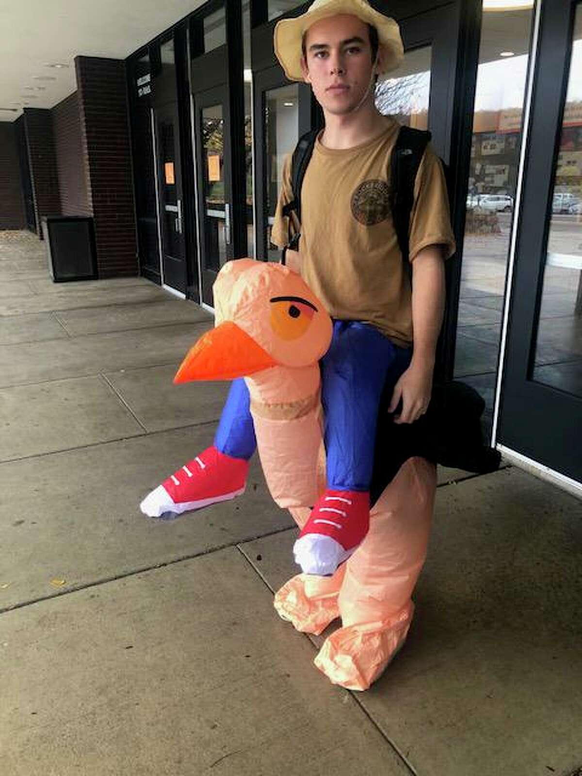 Ridgefield High School junior Ryan Stern rode his ostrich to school on Oct. 31.