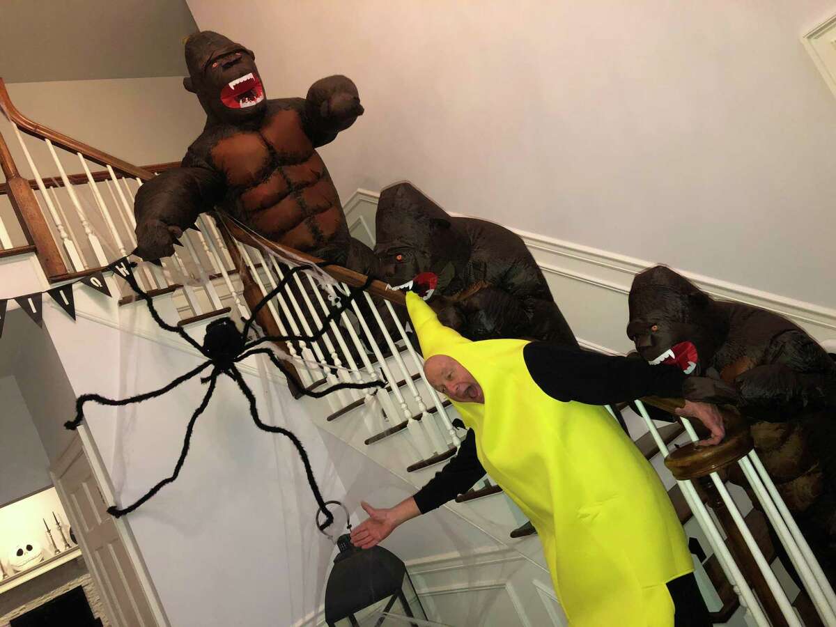 Three Farmingville-area students - Luke, 11, Helena, 9, and Dominic, 7 - were awarded first place in the Nod Hill Brewery Halloween costume contest on Oct. 31. The three students dressed as gorillas chasing a frightened banana.