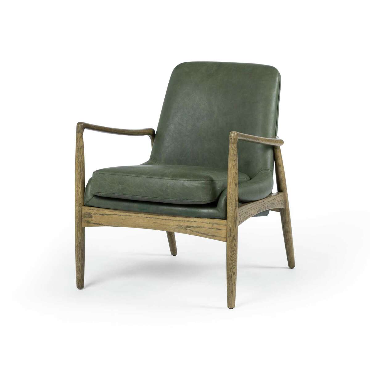 Four Hands’ Braden chair is upholstered in muted green leather. It was part of new collections shown at the Fall 2019 High Point Market.