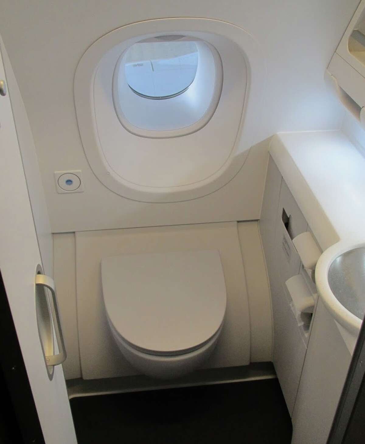 Collection 90+ Images where are the bathrooms located on a plane Completed