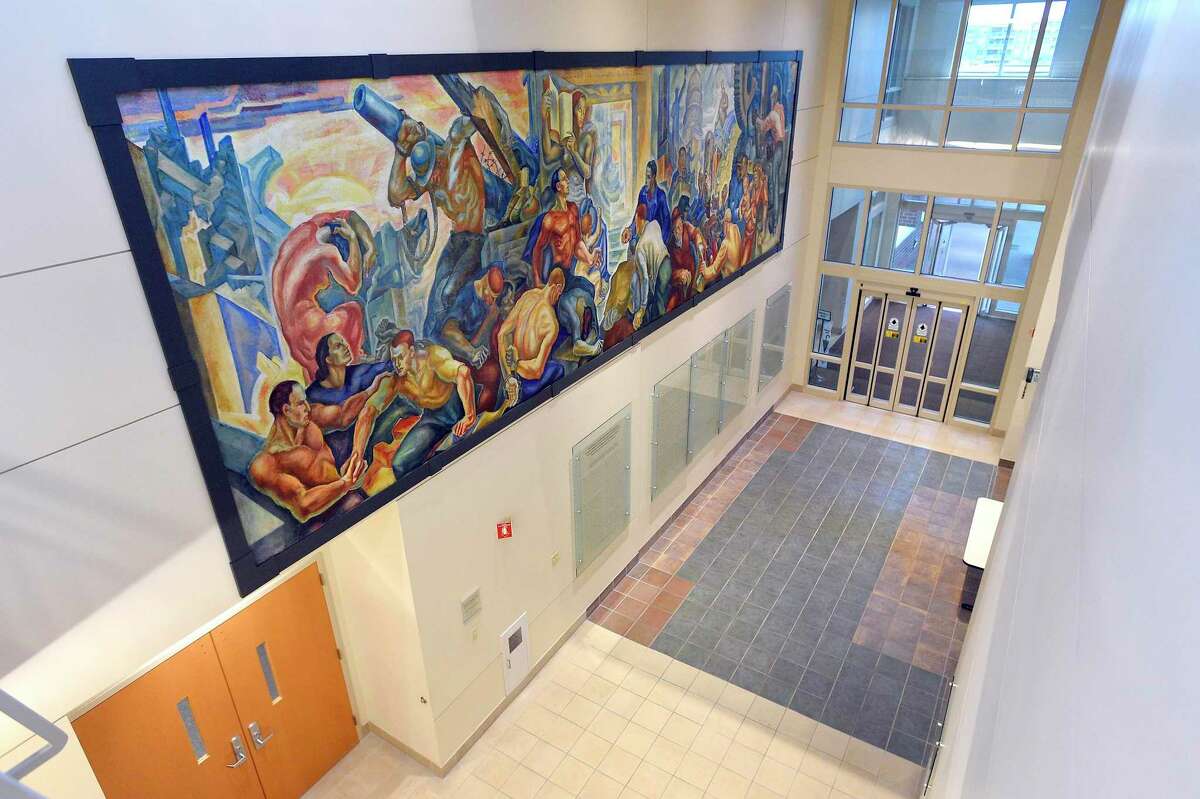 The newly restored James Henry Daugherty mural "The World Outside" from the Works Progress Administration era is photograph on Oct. 31, 2019 where it is on display at Stamford Health's Tully Health Center in Stamford, Connecticut. The mural previously hung at Stamford High School and was nearly lost to the city forever. It was recently returned to the city and is now on loan to Stamford Health.