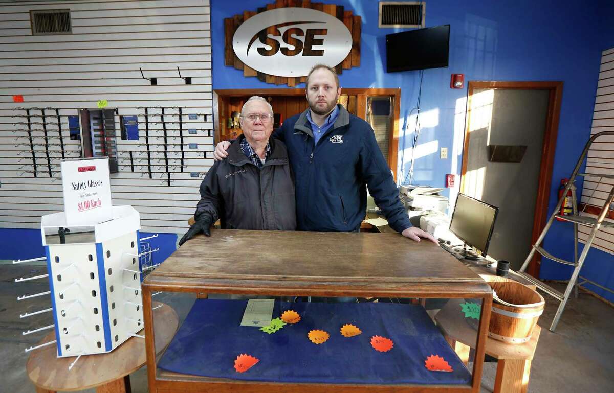 Kevin Doffing (right) and his 79-year-old father, Larry Doffing, ran Sam’s Safety Equipment, a family-owned business, for nearly 50 years, but closed the business in June due to an increasingly competitive market as well as difficulties in recovering after the business was flooded in multiple storms.