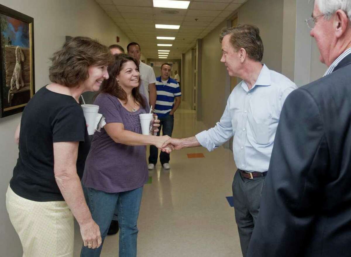 Ned Lamont meets CARTUS employees in a hall at Danbury's second-largest employer. Lamont toured CARTUS on 40 Apple Ridge Road. Monday, Aug. 9, 2010