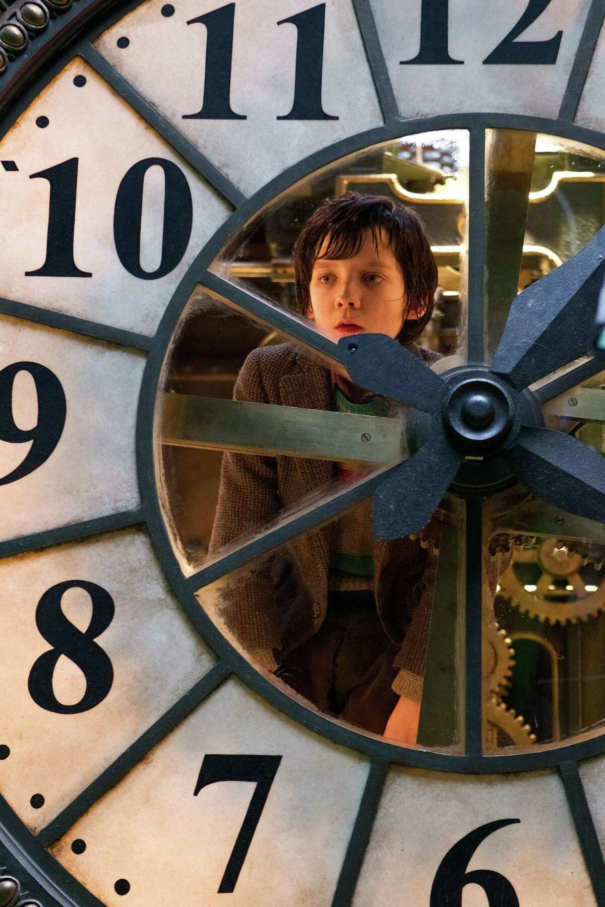 In this image released by Paramount Pictures, Asa Butterfield portrays Hugo Cabret in a scene from "Hugo."