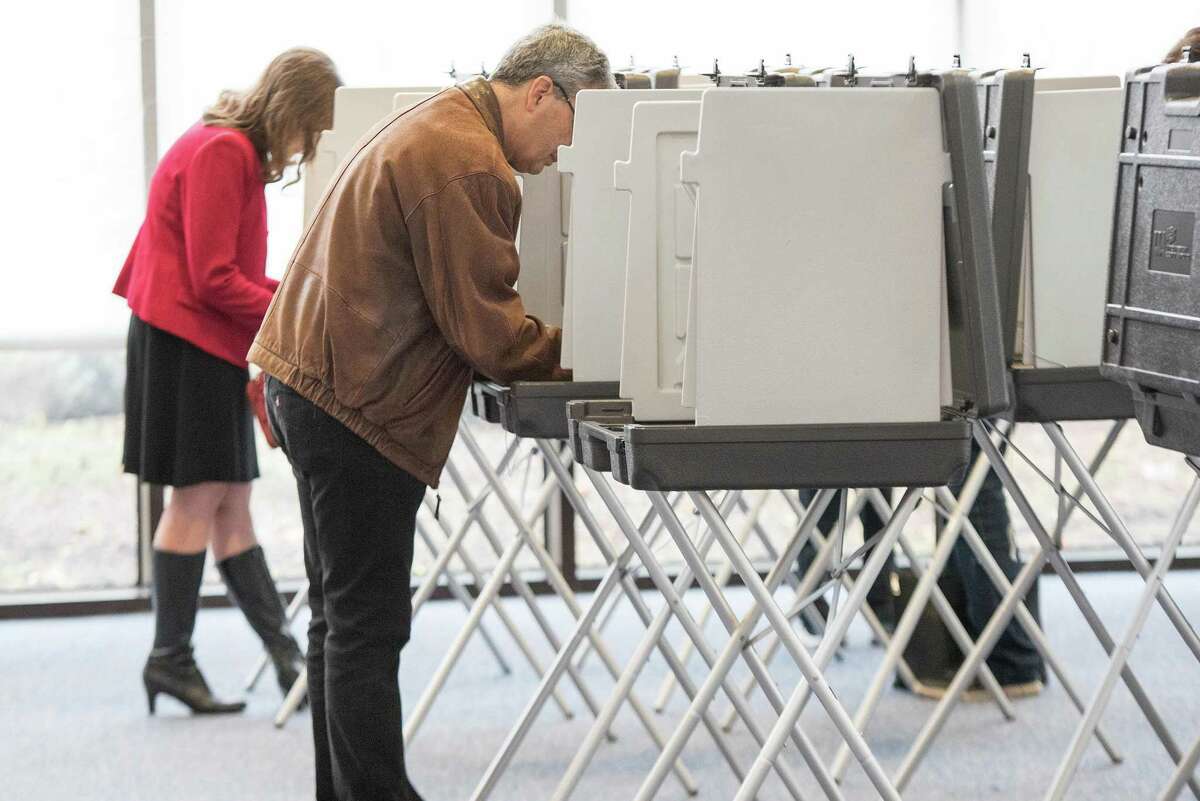 Scene from the polling center at Wilton High School on Nov. 5, 2019. For this year's election on Nov. 3, there will be sanitary precautions in place to prevent the spread of the coronavirus. To aid in safe voting conditions, the town of Wilton has received a $6,112. 50 grant from The Center for Tech and Civic Life.