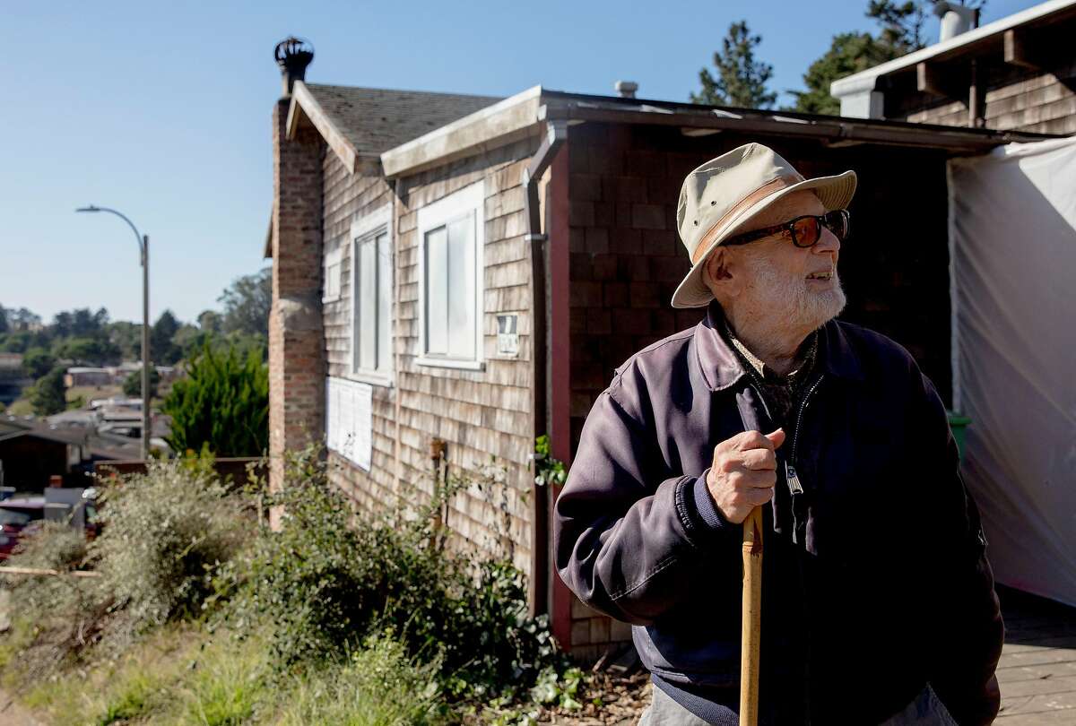 Mische Seligman, 98, stands in front of his childhood home and inherited property on Amber Drive in Diamond Heights before the start of a groundbreaking ceremony for the start of construction on new affordable housing by Habitat for Humanity in San Francisco, Calif. Friday, Nov. 1, 2019.