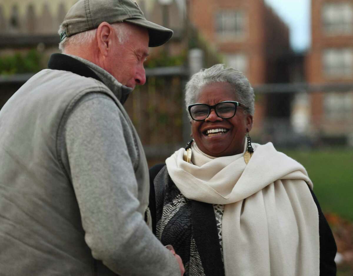 Candidate for Bridgeport mayor Marilyn Moore chats with a supporter outside the polls at the Bassick High School in Bridgeport, Conn. on Tuesday, November 5, 2019.