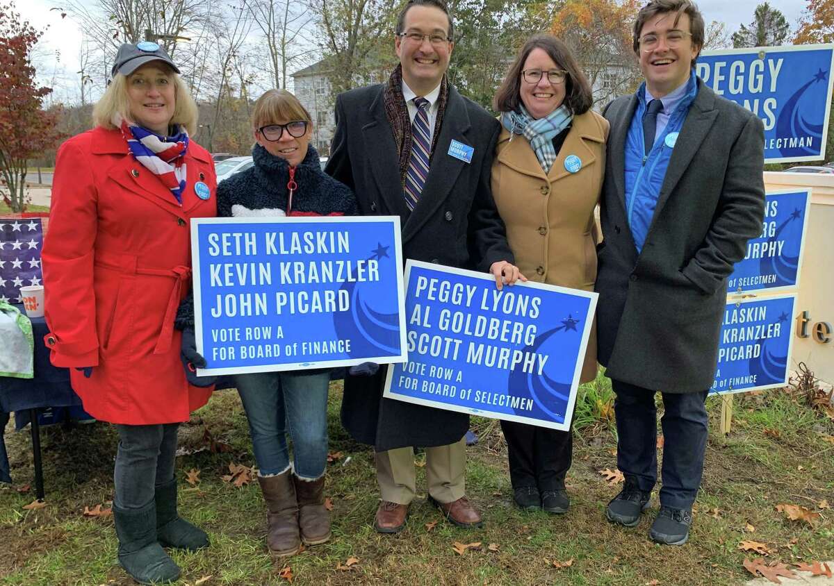 Democrat candidate for first selectman Peggy Lyons, second from right, with campaign workers at the polls at District 1 Madison Senior Center on Nov. 5, 2019. Lyons would find out that night that she won the race.