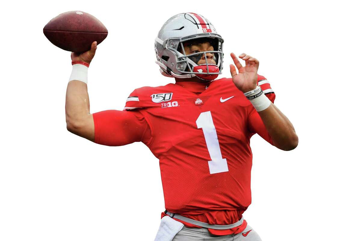 Justin Fields and Ohio State are No. 1 in the first College Football Playoff rankings and face a key games against No. 4 Penn State on Nov. 23.