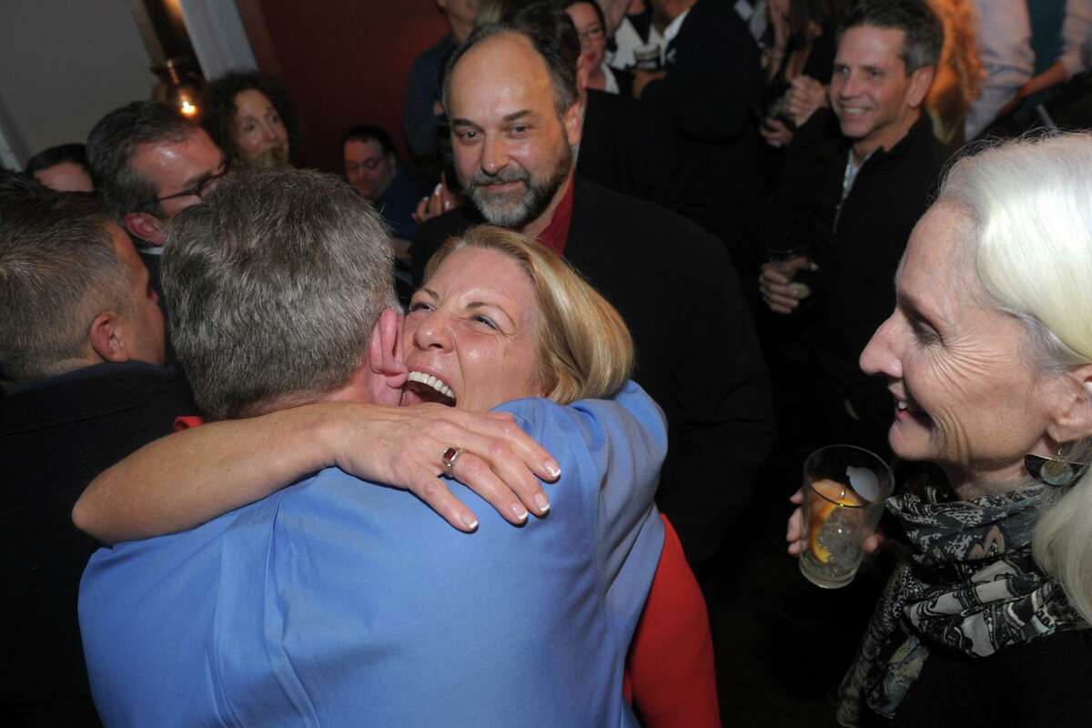 Brenda Kupchick is greeted by supporters as she arrives at her victory party at Flipside Burgers in Fairfield on Tuesday after defeating incumbent Mike Tetreau.