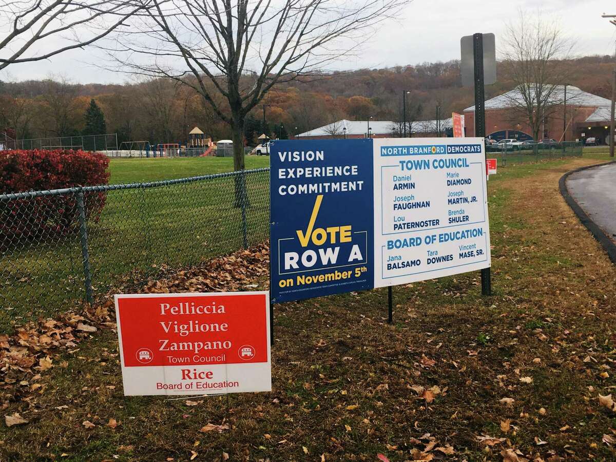 Campaign signs outside Jerome Harrison Elementary School in North Branford, one of the town's two polling places, on Nov. 5, 2019.