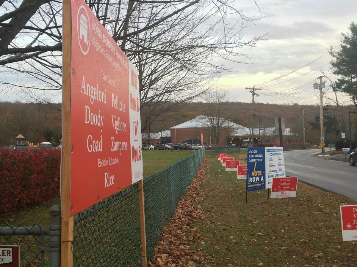 Campaign signs outside Jerome Harrison Elementary School in North Branford, one of the town's two polling places, on Nov. 5, 2019.