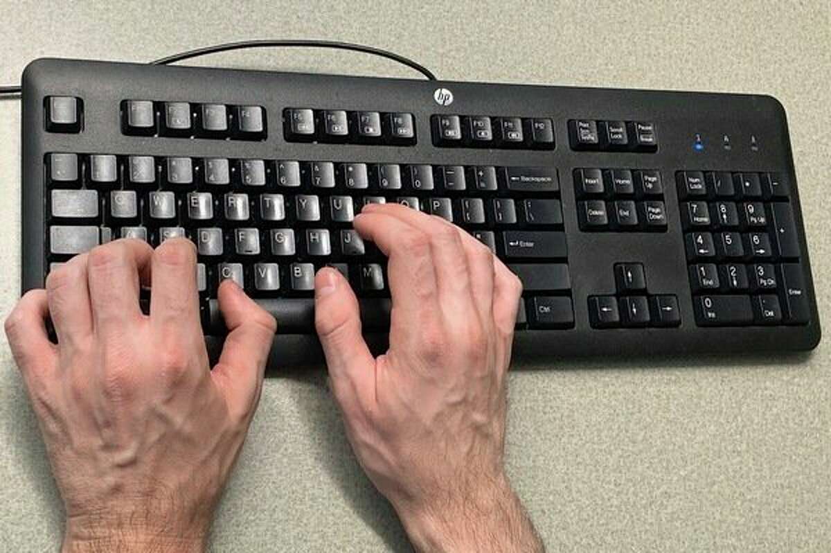County officials warn users to beware of viruses and phishing emails when working on company computer systems. (Herald Review photo/Cathie Crew)