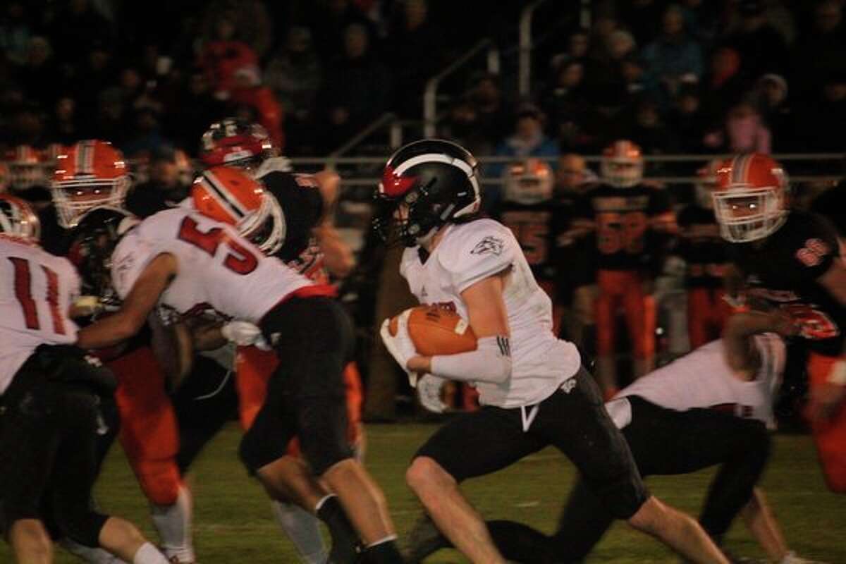 Landen Tomaski finds running room for Reed City against Kingsley. (Herald Review photo/John Raffel)