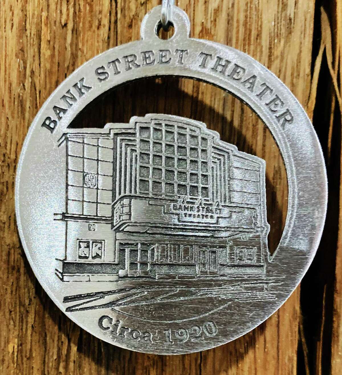 The New Milford Historical Society & Museum's 2019 commemorative medallionfeatures an image of the iconic Bank Street Theater