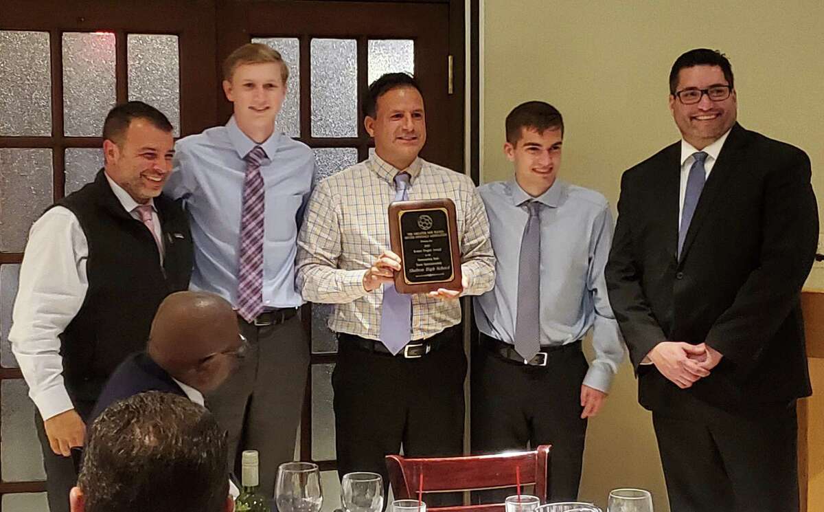 Receiving the Tingley Award from presenter Vic Figueroa (far right) are SHS assistant coach Augie Sevillano, team captain Nick Turco, head coach Isaac Montalvo and team captain Jack Neary.