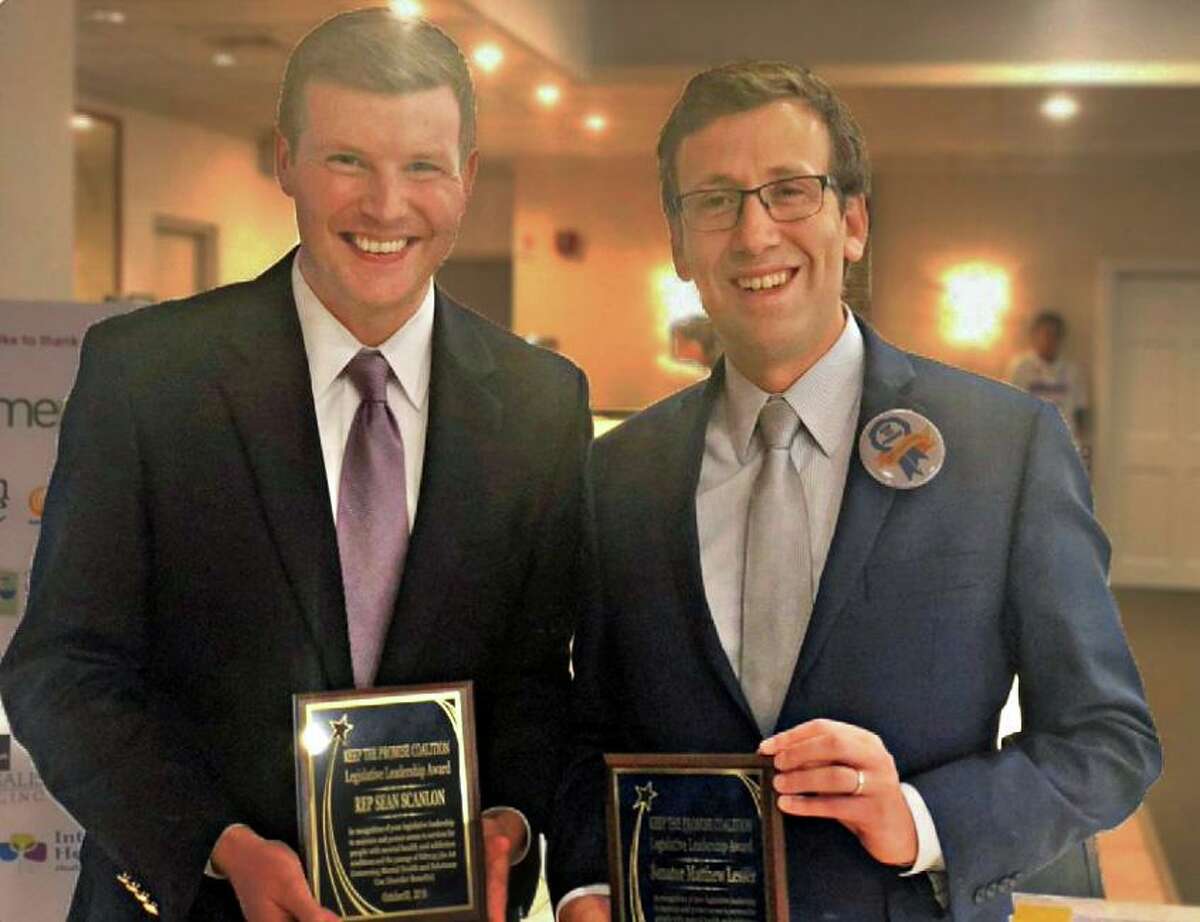 State Sen. Matt Lesser, right, D-Middletown, and state Rep. Sean Scanlon, D-Guilford, left, show off the Legislative Leadership Awards they received from the Keep the Promise Coalition Oct. 30 at the Elks Club in Middletown.