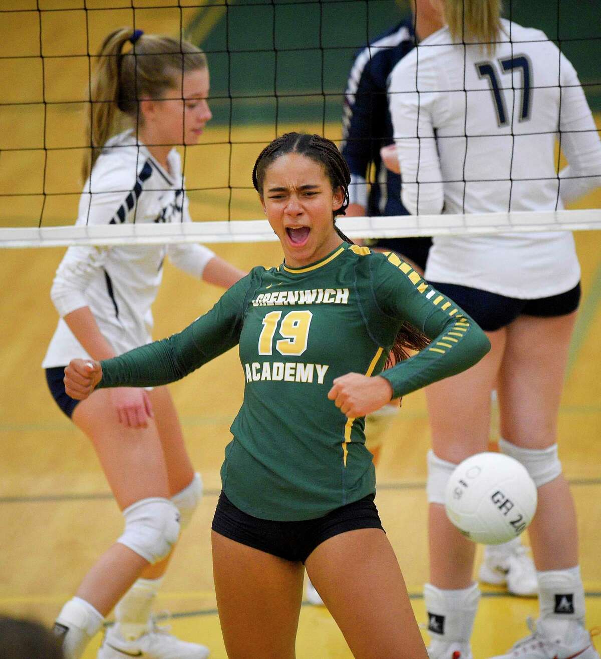 Greenwich Academy's Alexandra Trofort (19) celebrates a point in the first set against King in a FAA Volleyball semifinal match at Greenwich Academy on Nov. 6, 2019 in Greenwich, Connecticut.