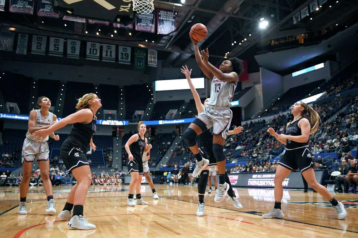 Connecticut's Christyn Williams goes up to the basket against Trevecca Nazarene during the first half of an NCAA college basketball exhibition game Wednesday, Nov. 6, 2019, in Hartford, Conn. (AP Photo/Jessica Hill)