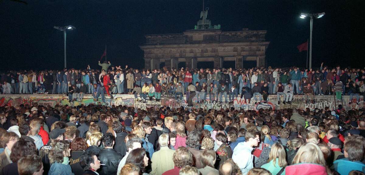 Iconic photos from the night the Berlin Wall fell 30 years ago