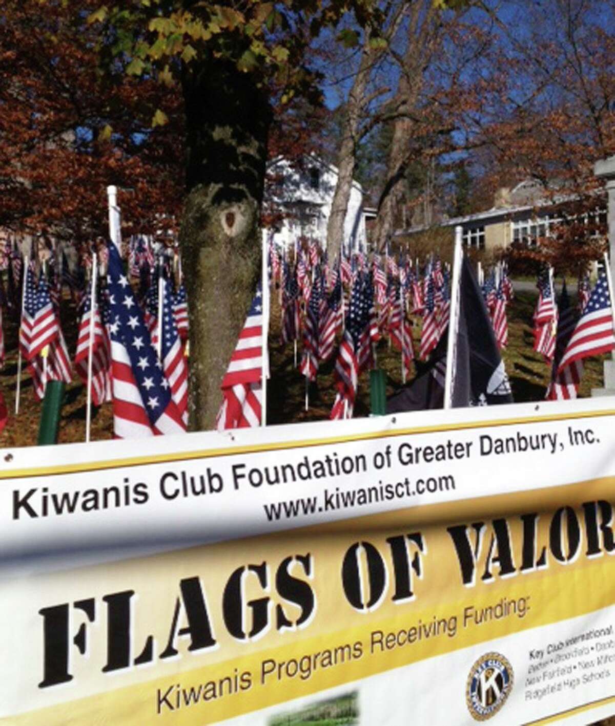 Hundreds of American flags are displayed on the hillside just north of the Village Green in New Milford. The Flags of Valor were placed by the Kiwanis Club of Danbury in tribute to the United States military, both veterans and those now serving. Many are individually sponsored by local businesses, or by families and friends of veterans and those now serving in the American military. The flags will be exhibited through Pearl Harbor Day, Sunday, Dec. 7. November 2014