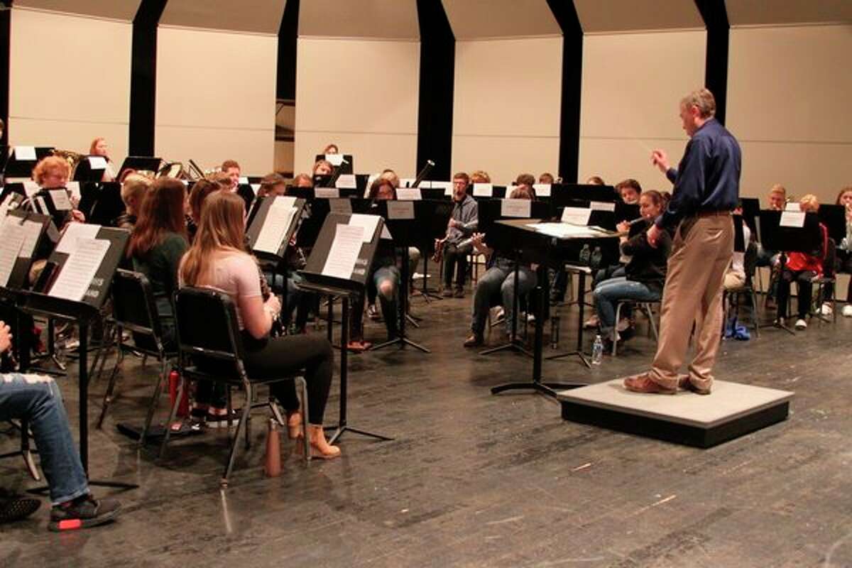 Grand Valley State University Band director Barry Martin leads the Manistee-Benzie Honors Band in rehearsals for last year's concert. Serving as director this year is Howard Wilson who currently conduct the Montcalm Community College Wind Ensemble. The free concert takes place at 7 p.m. on Nov. 19 at Benzie Central High School.  (File photo)