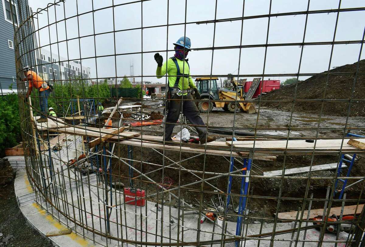 Construction workers on the job in June 2019 in Norwalk, Conn. Connecticut had among the lowest economic growth rates in the second quarter, according a Nov. 7 study by the Bureau of Economic Analysis.