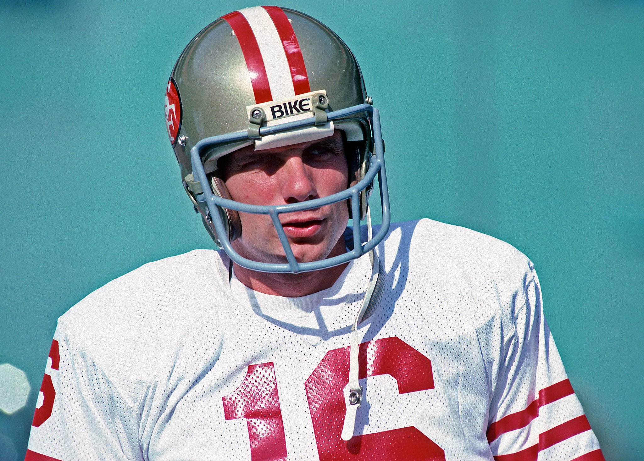 Quarterback Joe Montana of the San Francisco 49ers warms up before an