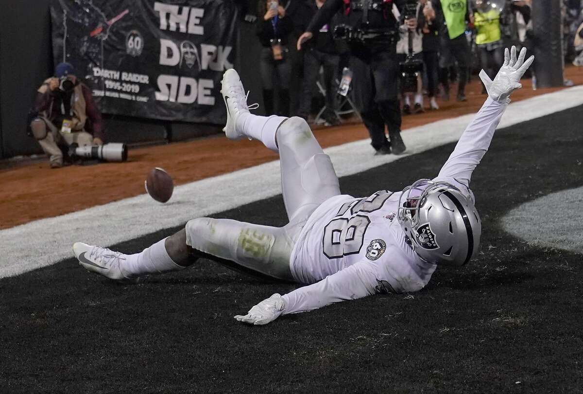 Oakland Raiders defensive back Erik Harris (25) holds onto the ball after  intercepting a pass against