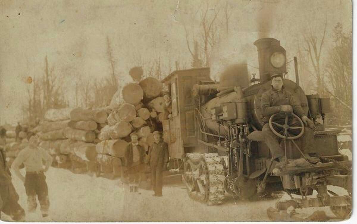 A machine called a "steam hauler" was widely used in lumbering to replace teams in hauling logs from the woods. Even today there is a road named Steam Hauler Road north of Honor. (Courtesy Photo/Benzie Area Historical Society)