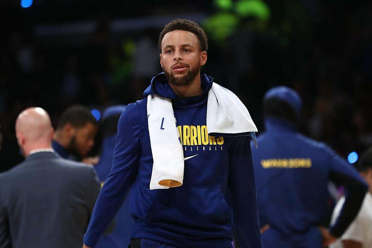 LOS ANGELES, CALIFORNIA - OCTOBER 16: Stephen Curry #30 of the Golden State Warriors looks on during a timeout during the second half of a game against the Los Angeles Lakers at Staples Center on October 16, 2019 in Los Angeles, California. ~~