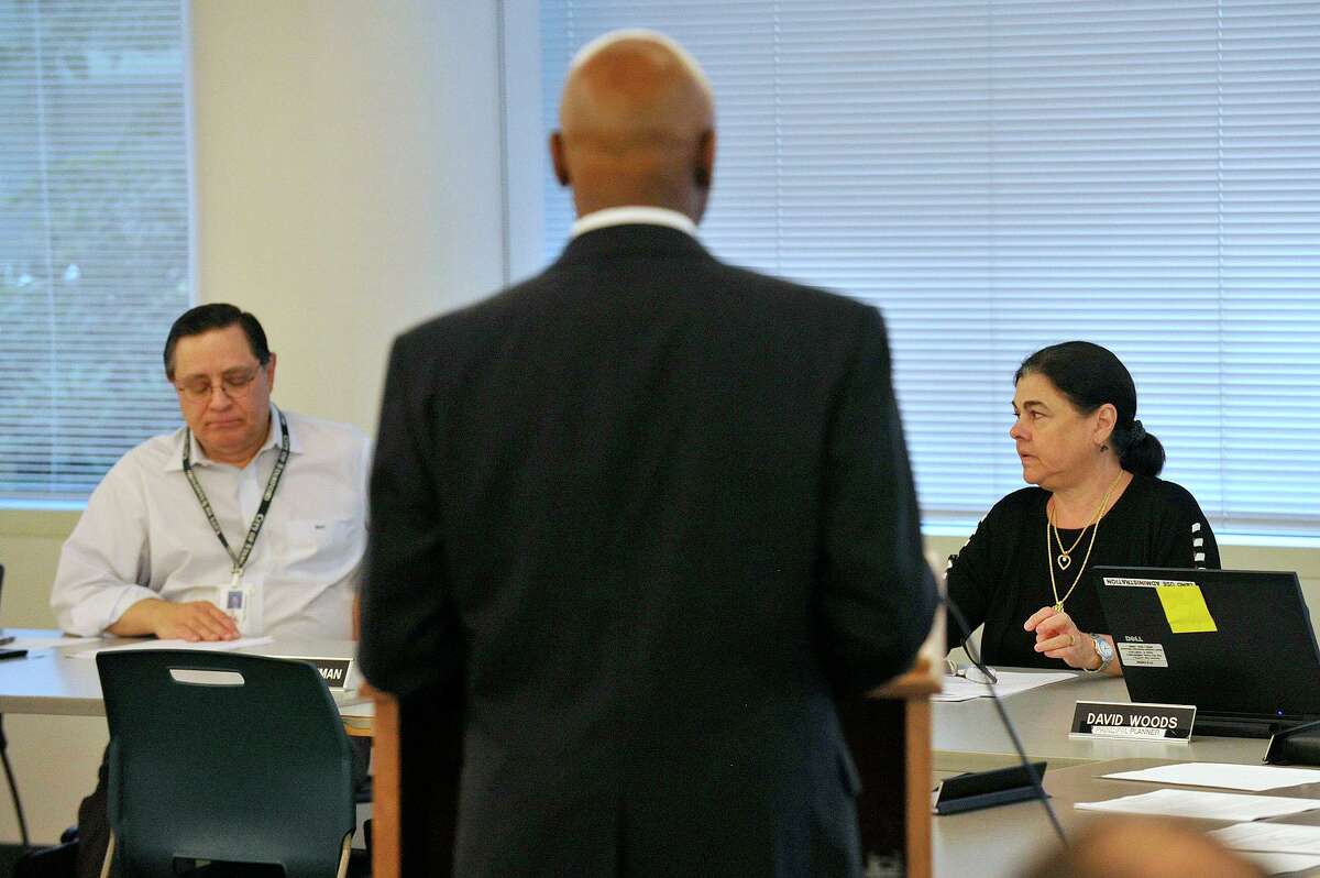 Planning Board member Michael Totilo, left, and Chairman Theresa Dell, right, listen as Michael Pollard, chief of staff to the mayor, speaks during a Planning Board meeting in 2015. Totilo’s reappointment to the Planning Board failed after a tied Board of Representatives vote Wednesday.