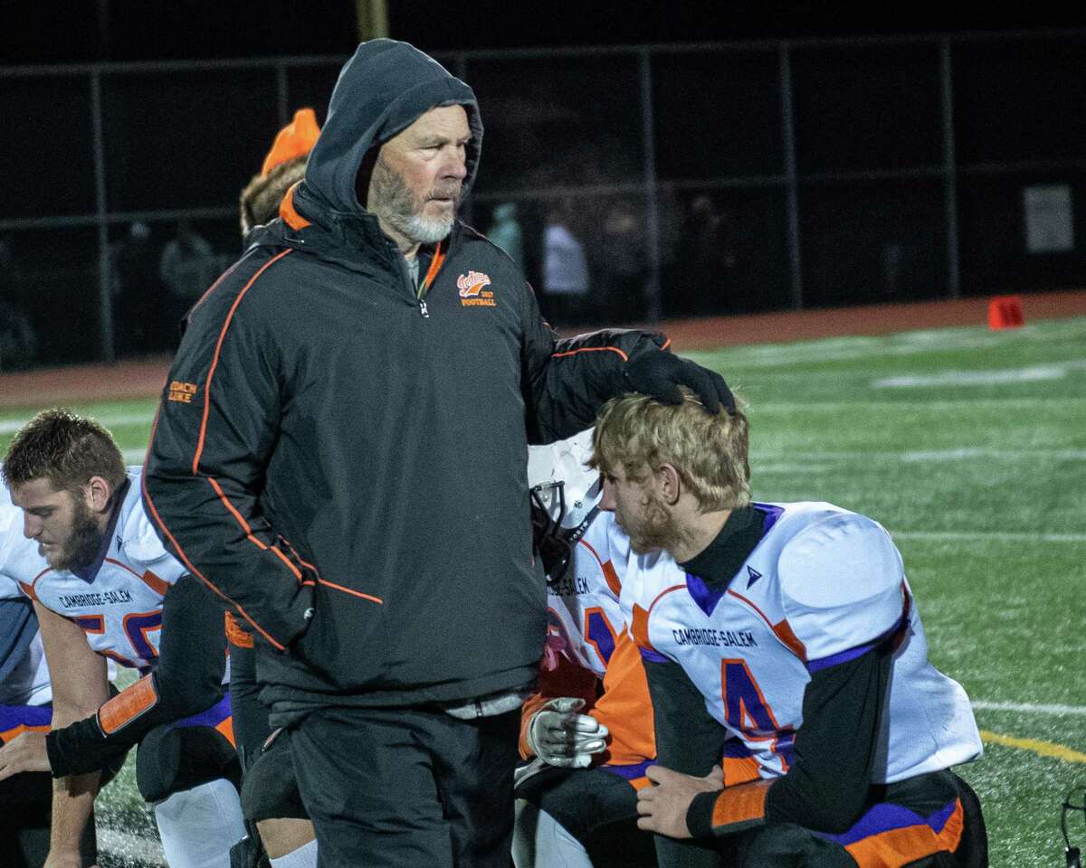 Cambridge/Salem coach Doug Luke consoles Blake Baylor after losing the Section II, Class C Super Bowl to Stillwater at Lansingburgh High School on Friday, Nov. 8, 2019 (Jim Franco/Special to the Times Union.)