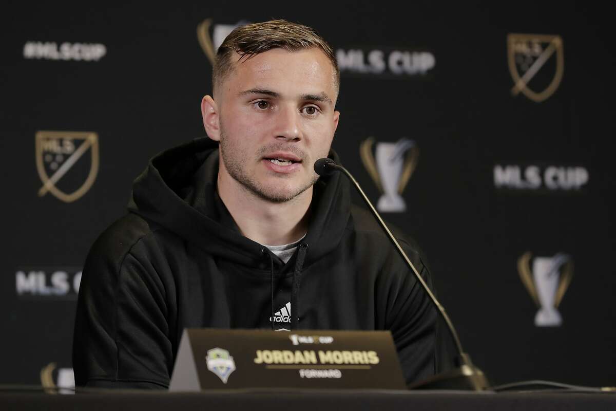 Seattle Sounders forward Jordan Morris talks to reporters Thursday, Nov. 7, 2019, at a news conference in Seattle. The Sounders are scheduled to face Toronto FC Sunday in the MLS Cup soccer match in Seattle, the third time the two teams will have met for the MLS championship. (AP Photo/Ted S. Warren)