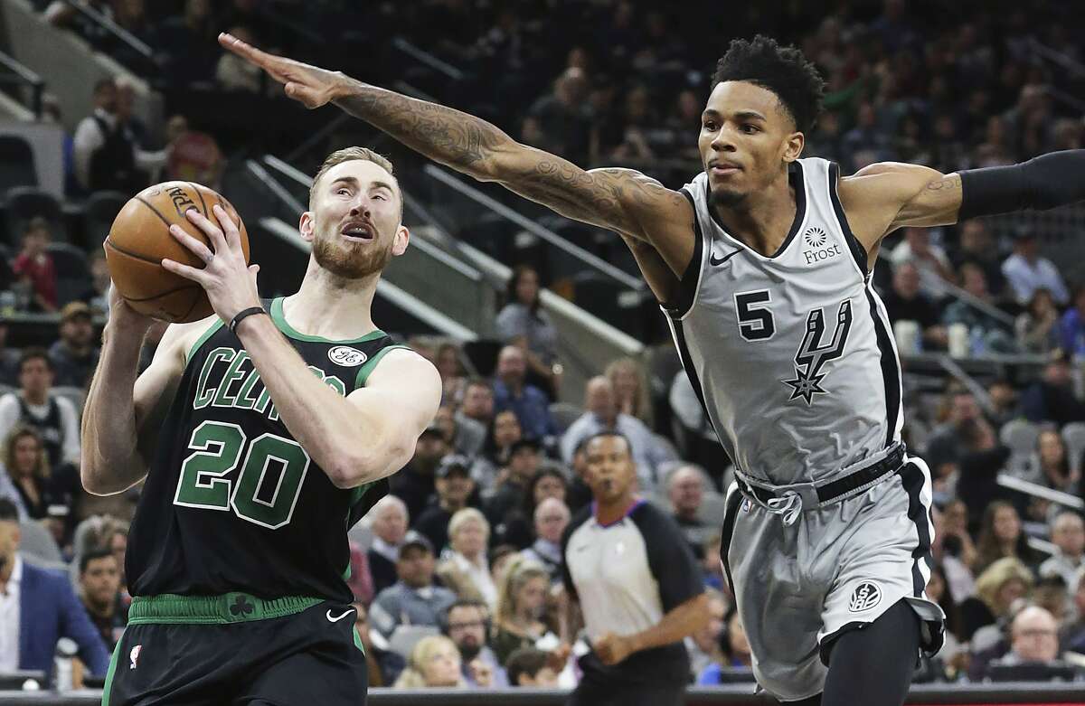 Dejounte Murray tries to keep Gordon Hayqard from getting to the hoop as the Spurs hosts the Celtics at the AT&T Center on Nov. 9, 2019.