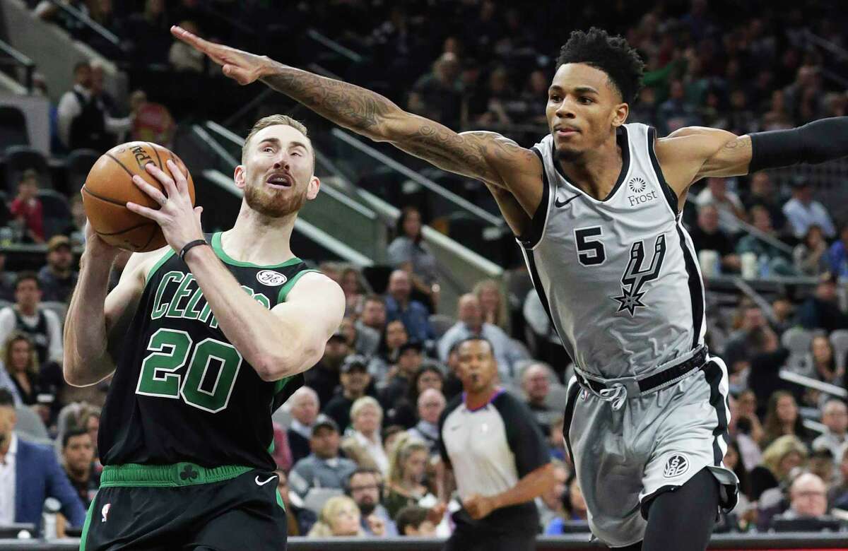Dejounte Murray tries to keep Gordon Hayqard from getting to the hoop as the Spurs hosts the Celtics at the AT&T Center on Nov. 9, 2019.