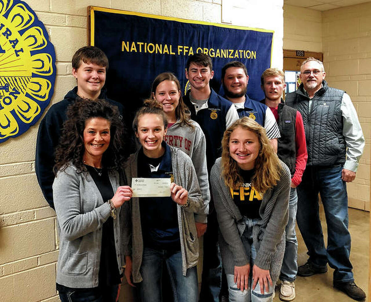 Farm Credit Illinois has made a $500 donation to the Franklin FFA program. The money will be used to support the program and the future of the agriculture industry. Students accepting the donation are Mollie Allen (front row, center) and Bethany Bergschneider (front row, right); Cody Spencer (back row, from left), Abby Crow, Jackson Smith, Kyle Colwell and Ethan Hansell.