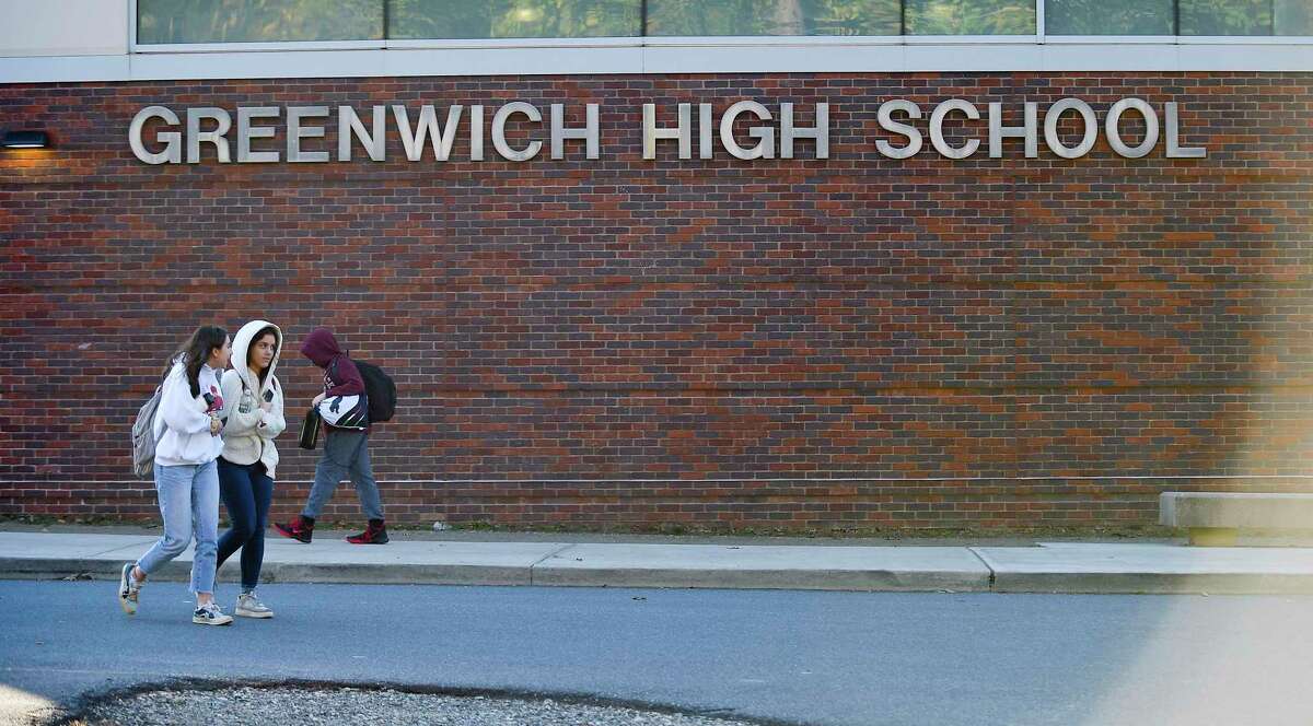 Students pass in front of Greenwich High School at class dismissal on Nov. 8, 2019 in Greenwich, Connecticut.