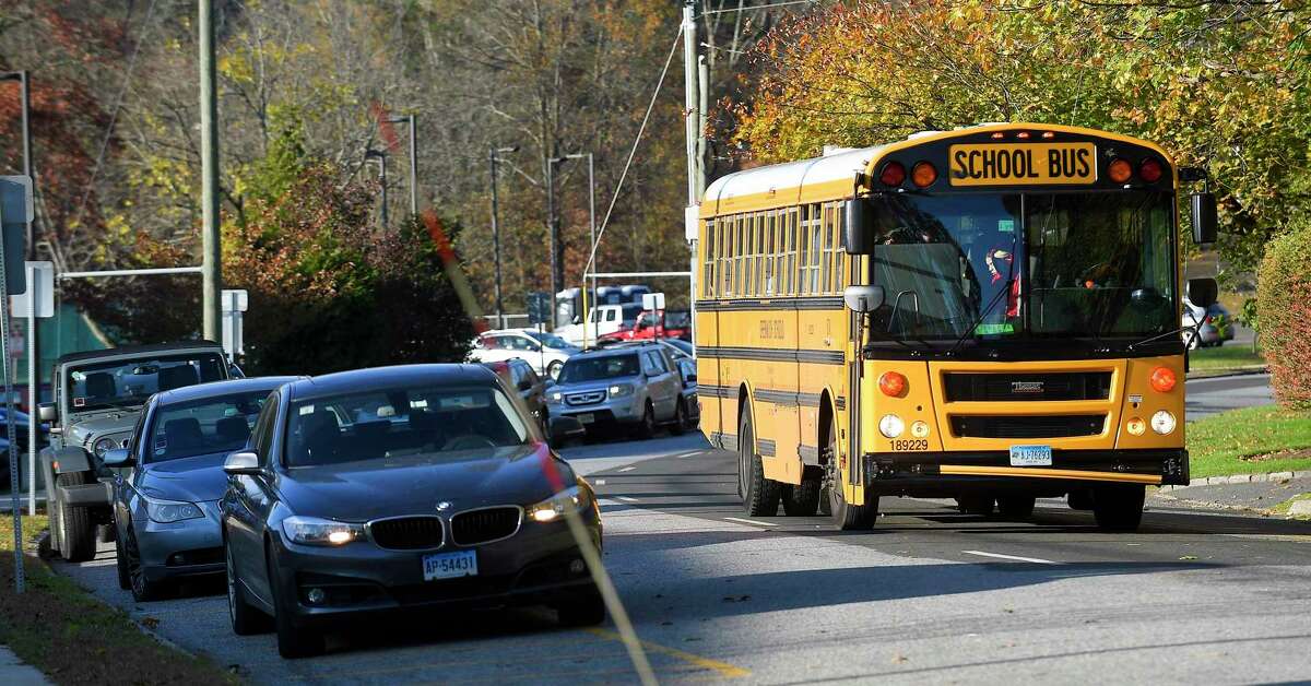 A bus carrying student travels down Hillside Road in front of Greenwich high School on Nov. 8, 2019 in Greenwich, Connecticut.