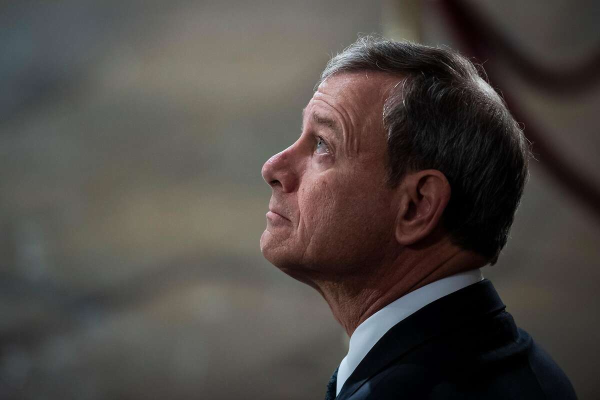WASHINGTON, DC - DECEMBER 3 : Supreme Court Chief Justice of the United States John G. Roberts, Jr. waits for the arrival of Former president George H.W. Bush to lie in State at the U.S. Capitol Rotunda on Capitol Hill on Monday, Dec. 03, 2018 in Washington, DC. (Photo by Jabin Botsford/Pool)