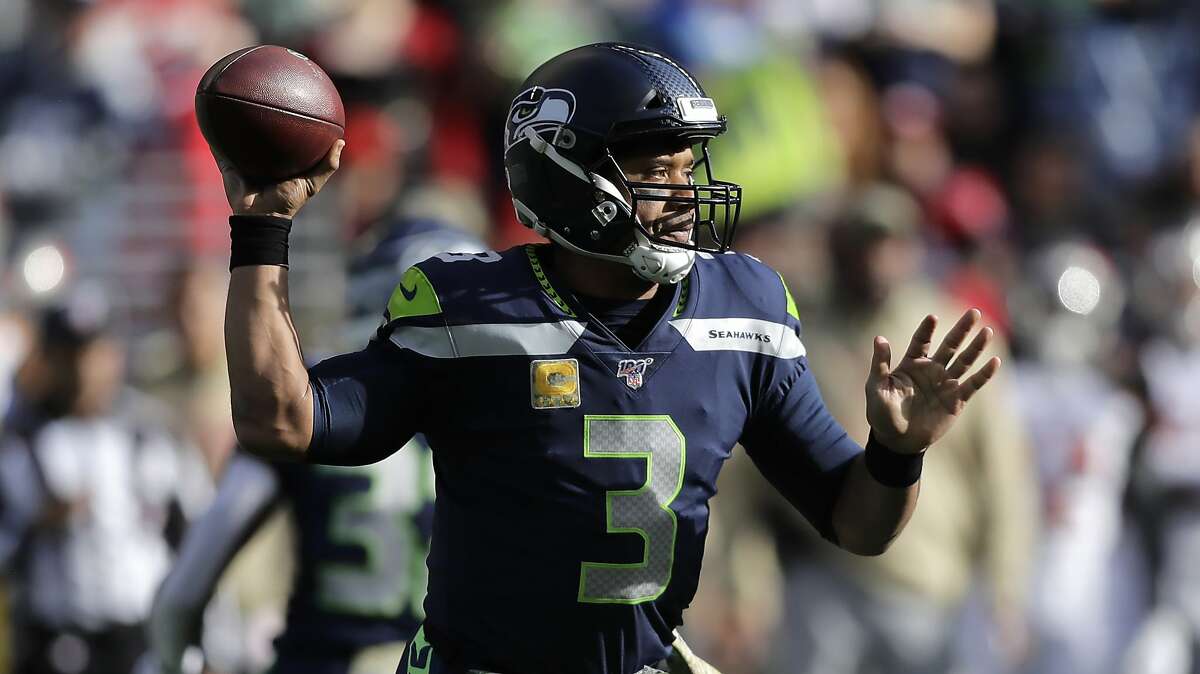 Seattle Seahawks quarterback Russell Wilson passes during an NFL football game against the Tampa Bay Buccaneers, Sunday, Nov. 3, 2019, in Seattle. (AP Photo/John Froschauer)