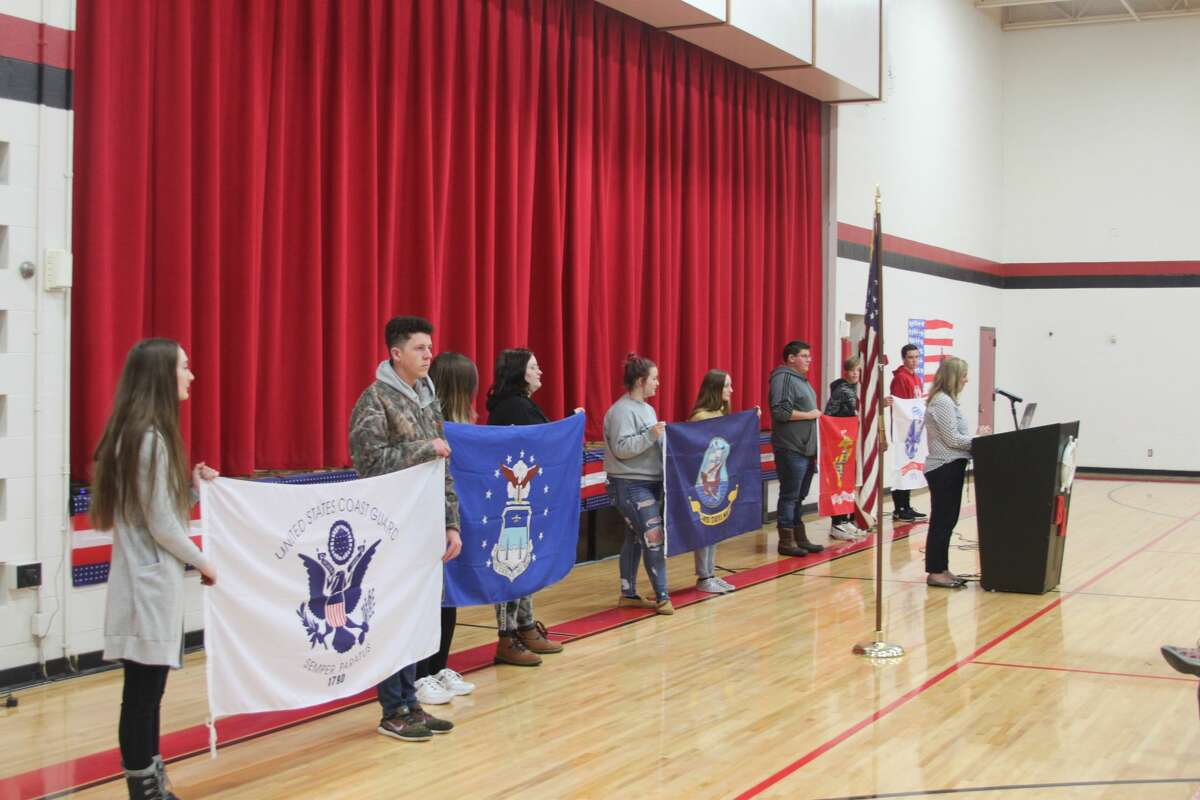 Students and staff at Bear Lake Schools honored those who served our country in their annual Veterans Day ceremony on Monday morning. Sixth grade teacher Jeff Harthun gave the main address and following the ceremony the students showed their appreciation by thanking the veterans for their service and by serving them cake in a reception. Students also honored the veterans with patriotic songs they sang and they led everyone in the Pledge of Allegiance.