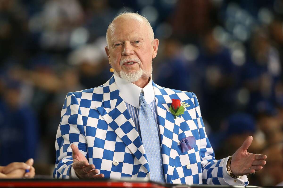 FILE - Hockey commentator Don Cherry does a television interview before the Tampa Bay Rays MLB game against the Toronto Blue Jays on April 13, 2015 at Rogers Centre in Toronto, Ontario, Canada. Cherry was fired Monday for calling immigrants "you people" in a television rant in which he said new immigrants are not honoring the country's fallen soldiers.