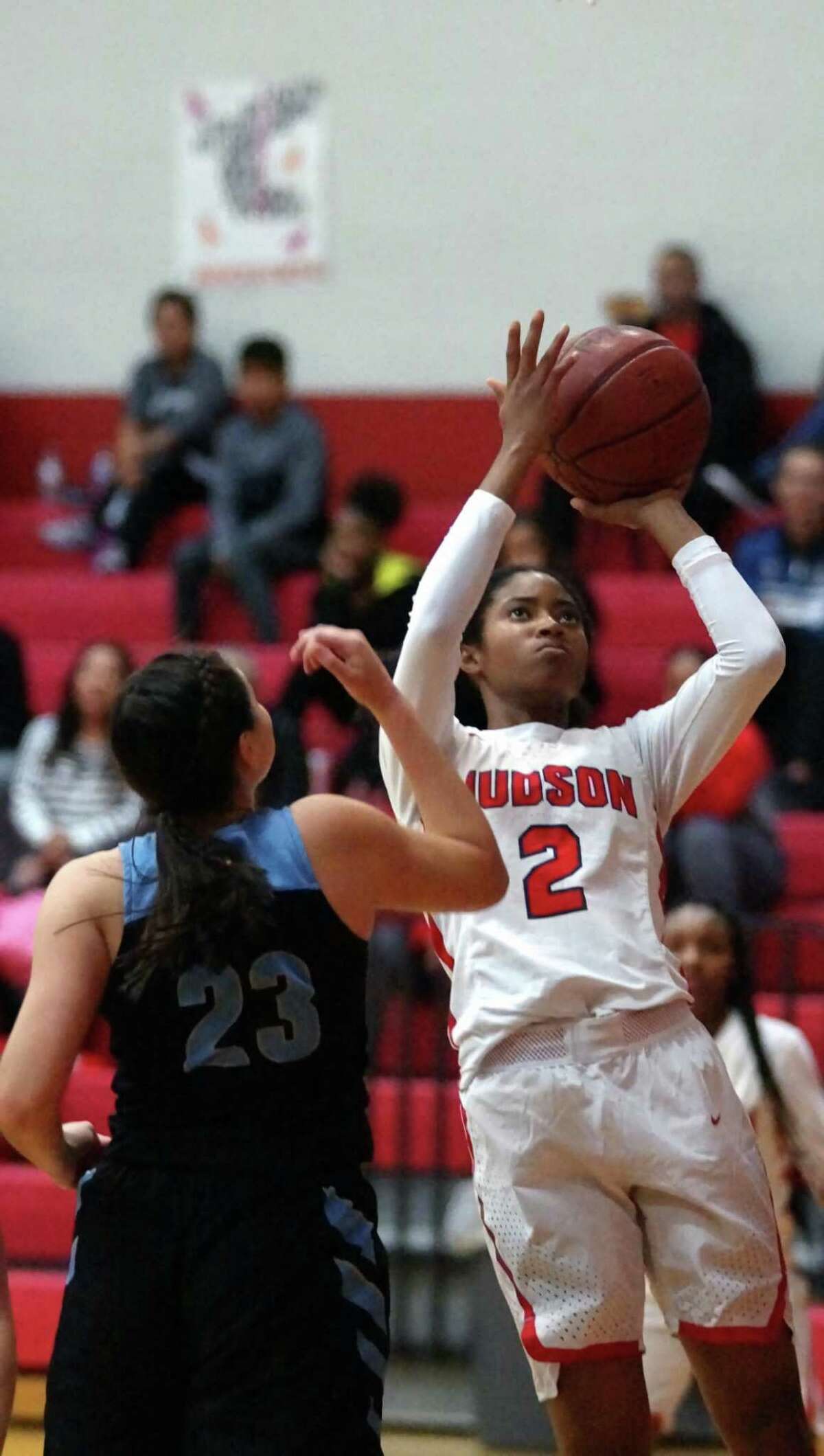 Judson’s Teanna Huggins (2) goes over Laredo United South’s Millie Hernandez during Judson’s 38-23 home win to open their 2019 season.