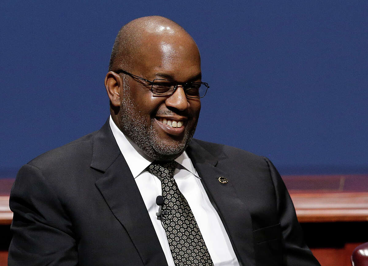 FILE - In this Friday, Feb. 13, 2015, file photo, Bernard Tyson, chairman and CEO of Kaiser Permanente, smiles while sitting on a panel at the White House Summit on Cybersecurity and Consumer Protection in Stanford, Calif. Health care provider Kaiser Permanente said Sunday, Nov. 10, 2019, that Tyson died earlier in the day, at the age of 60. (AP Photo/Jeff Chiu, File)
