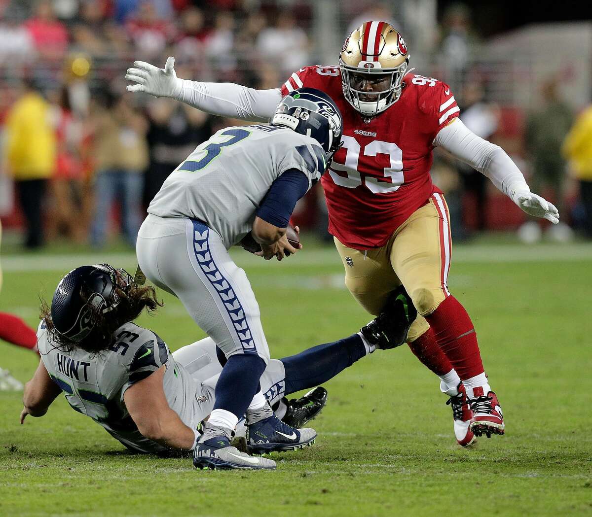 DJ Jones (93) sacks Russell Wilson (3) in the first half as the San Francisco 49ers played the Seattle Seahawks at Levi�s Stadium in Santa Clara, Calif., on Monday, November 11/11/19, 2019.