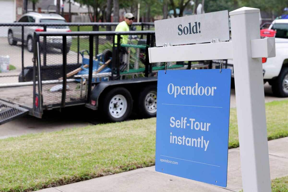 Bairo Rodriguez, with CLS Landscaping and Maintenance, gets gear from a trailer as he and the rest of his crew complete the weekly lawn, bush and tree services on a for-sale home owned by Opendoor Tuesday, Oct. 29, 2019 in Katy, TX. Opendoor has spent over $11 million in the Houston region on outside contractors who repair and maintain homes since it launched in Houston roughly a year ago.