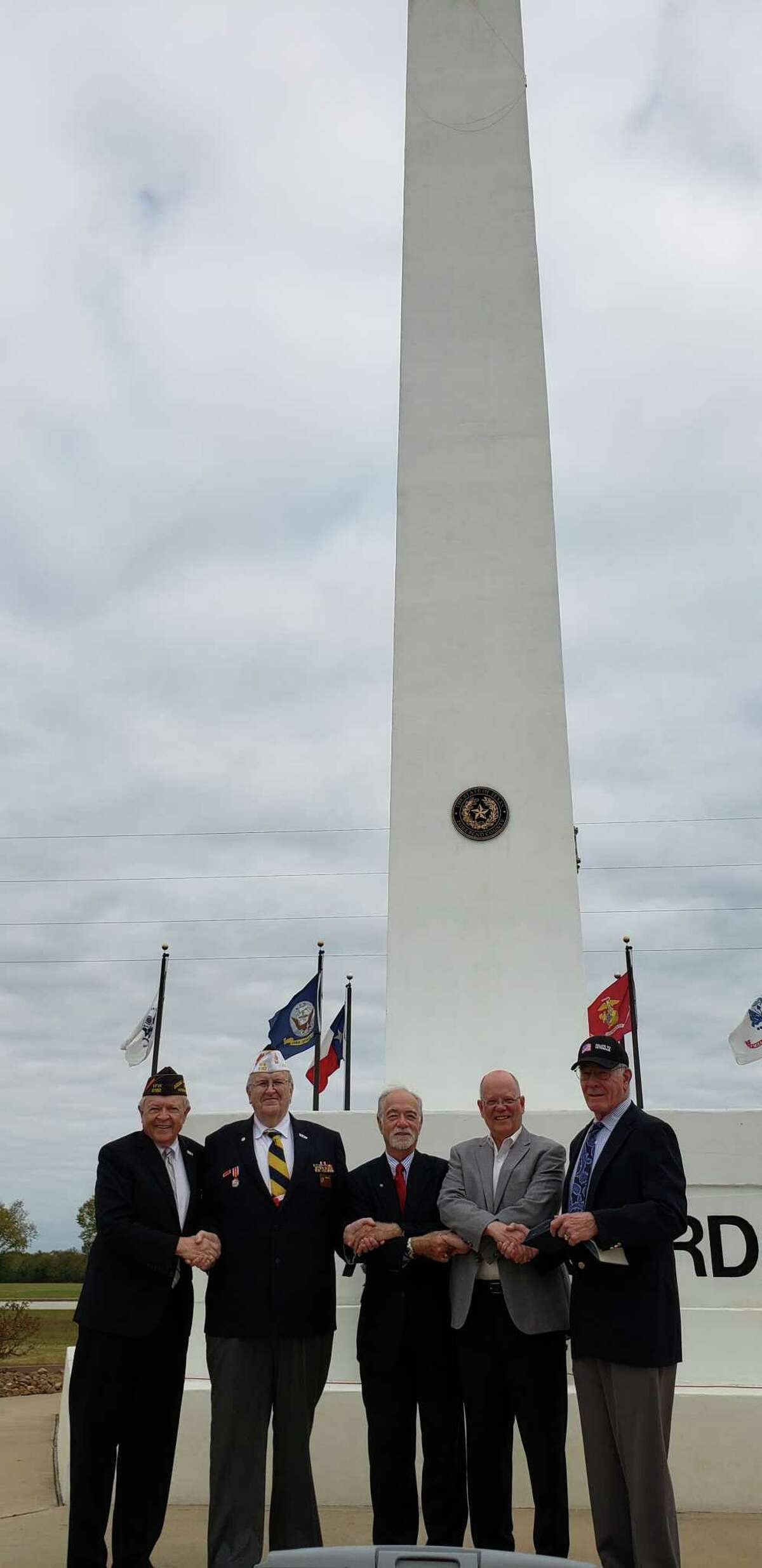 The Rotary Club of Katy and Katy Veterans of Foreign Wars Post 9182 observed Veterans Day on Nov. 11 at Armed Forces Memorial Tower in Fort Bend County Freedom Park. From left are: Ken Burton, Katy Rotarian; Don Byrne, VFW Post commander;  David Frishman, Katy Rotarian; Andy Meyers, Fort Bend County Precinct 3 commissioner; and Ron Hudson, colonel retired USACE.
