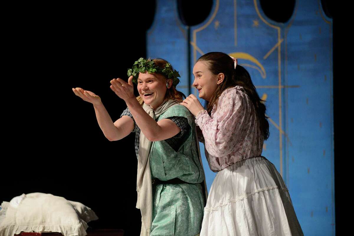 Peter Pan, played by Hannah Timmons, and Wendy, played by Sara Glancy, perform during a Theatre Works USA performance of “Peter Pan,” which is at the Westport Country Playhouse for two performances on December 8 as part of the Playhouse’s Family Festivities Series.